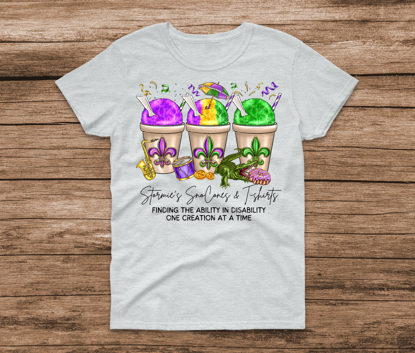 Stormie's Snoballs Mardi Gras Cotton & Softstyle Purple Shirt